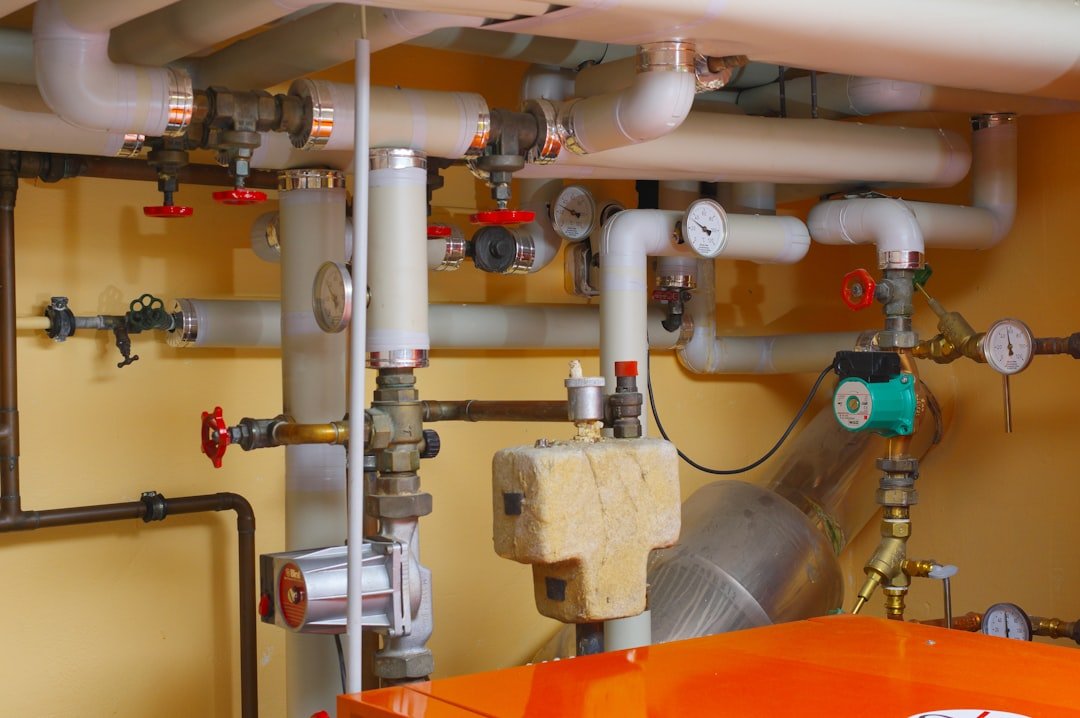 services-02 pipes-and-valves-in-a-room-with-orange-table-u0jpgktmtwe